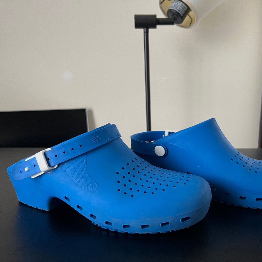 Blue Calzuro clogs with strap